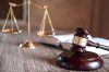 Scales of justice and Gavel on wooden table and agreement in Courtroom, Justice and Law concept.